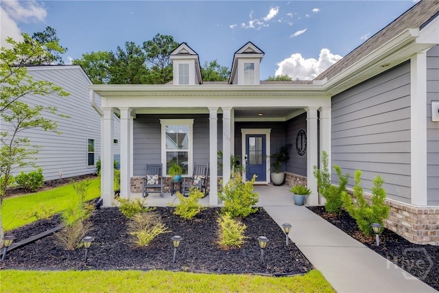 139 Harvest Hl, Pooler, GA 31322 - doorway to property featuring covered porch