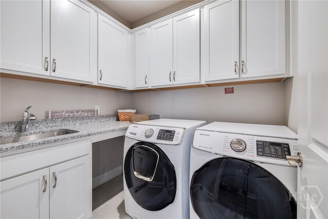 139 Harvest Hl, Pooler, GA 31322 - laundry room featuring washer and dryer and cabinet space