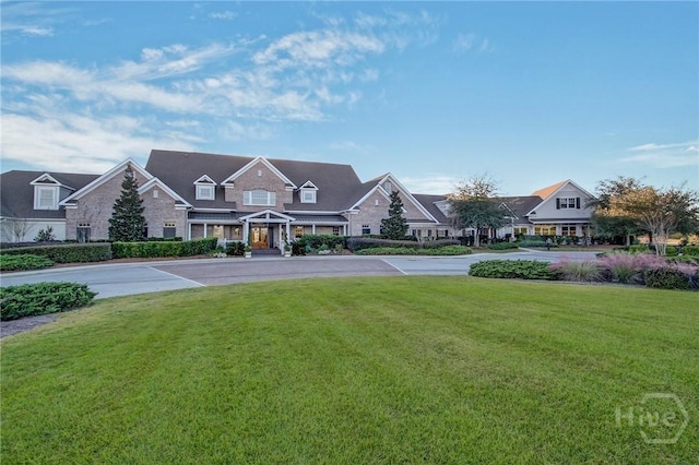 139 Harvest Hl, Pooler, GA 31322 - view of front of property featuring stone siding and a front lawn