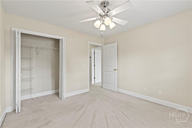 41 Patriot Dr, Richmond Hill, GA 31324 - unfurnished bedroom featuring carpet floors, a closet, and a ceiling fan
