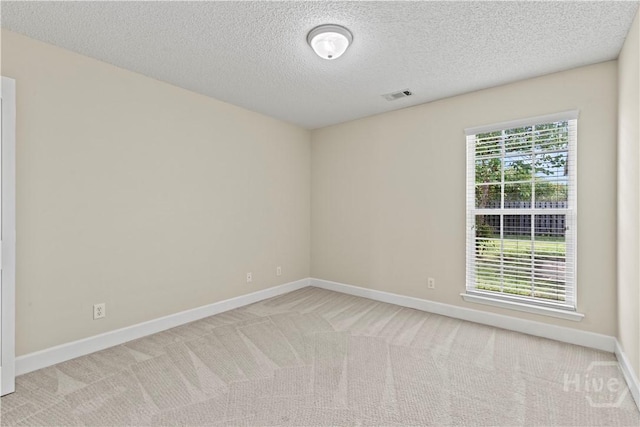 41 Patriot Dr, Richmond Hill, GA 31324 - carpeted spare room with baseboards and a textured ceiling