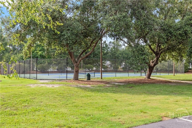 41 Patriot Dr, Richmond Hill, GA 31324 - view of home's community featuring a tennis court