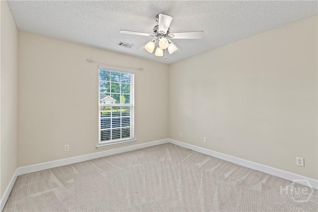 41 Patriot Dr, Richmond Hill, GA 31324 - spare room with carpet floors, a ceiling fan, and a textured ceiling