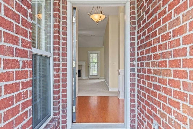 41 Patriot Dr, Richmond Hill, GA 31324 - view of exterior entry with brick siding