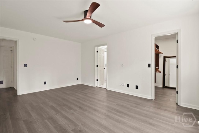 115 Yellow Jasmine Ct, Pooler, GA 31322 - empty room with a ceiling fan and dark wood-style flooring