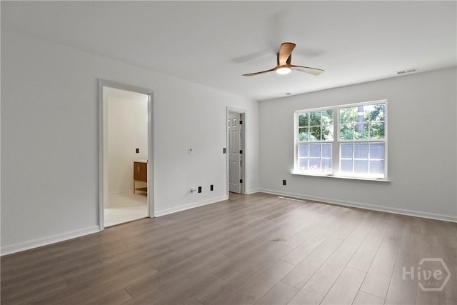 115 Yellow Jasmine Ct, Pooler, GA 31322 - spare room featuring a ceiling fan and wood finished floors