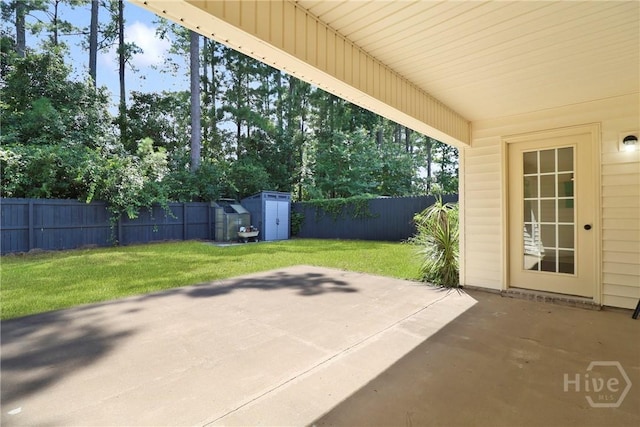 115 Yellow Jasmine Ct, Pooler, GA 31322 - fenced backyard with a patio area and a storage unit