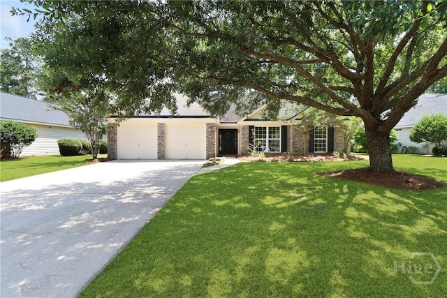 115 Yellow Jasmine Ct, Pooler, GA 31322 - single story home with brick siding, driveway, a front yard, and a garage