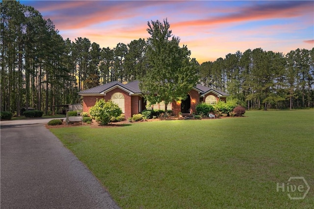 2055 Blankenbaker Rd, Statesboro, GA 30458 - ranch-style home featuring a lawn and a metal roof