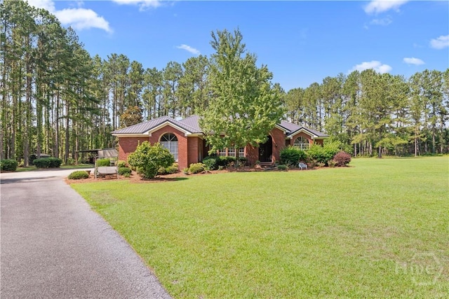 2055 Blankenbaker Rd, Statesboro, GA 30458 - view of front of property featuring a front yard and a metal roof