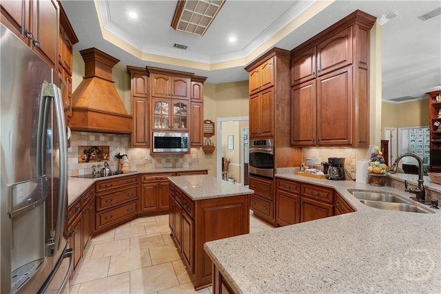 2055 Blankenbaker Rd, Statesboro, GA 30458 - kitchen featuring stainless steel appliances, crown molding, custom exhaust hood, backsplash, and light stone countertops