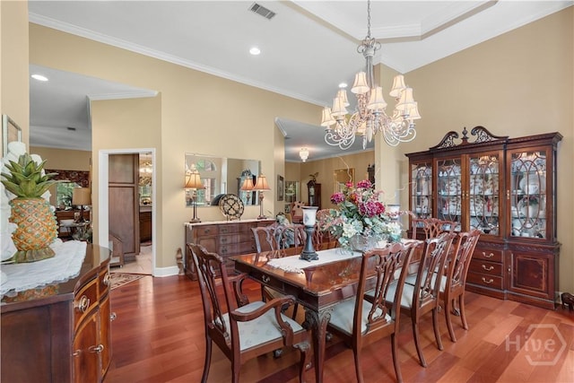 2055 Blankenbaker Rd, Statesboro, GA 30458 - dining space featuring a chandelier, wood finished floors, ornamental molding, and recessed lighting