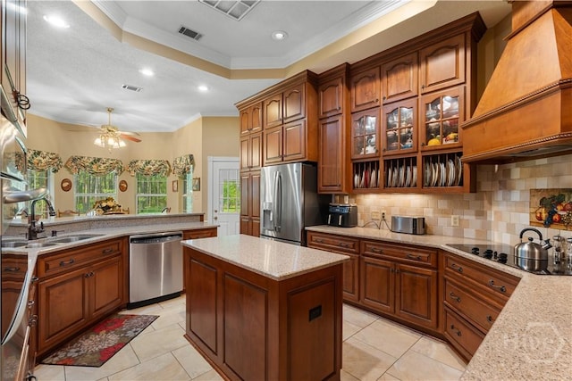2055 Blankenbaker Rd, Statesboro, GA 30458 - kitchen with stainless steel appliances, premium range hood, ornamental molding, backsplash, and a center island