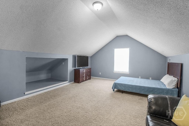 250 Laurel Hill Cir, Richmond Hill, GA 31324 - carpeted bedroom featuring a textured ceiling and vaulted ceiling