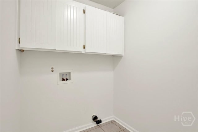 716 Greenwich Dr, Richmond Hill, GA 31324 - laundry room with cabinet space, hookup for a washing machine, tile patterned floors, and electric dryer hookup