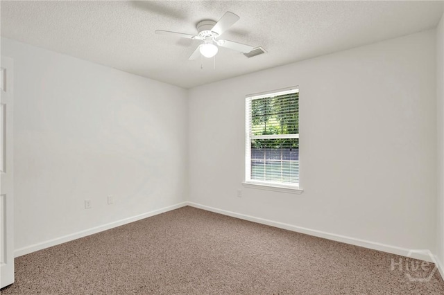 716 Greenwich Dr, Richmond Hill, GA 31324 - spare room with carpet flooring, ceiling fan, and a textured ceiling