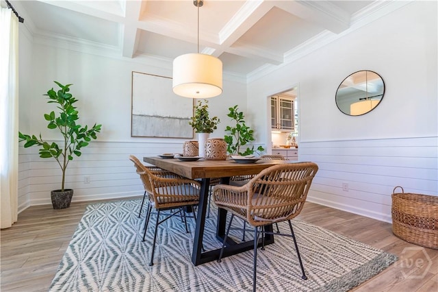 33 Spring Hill Dr, Richmond Hill, GA 31324 - dining room with coffered ceiling, light wood finished floors, beam ceiling, ornamental molding, and wainscoting