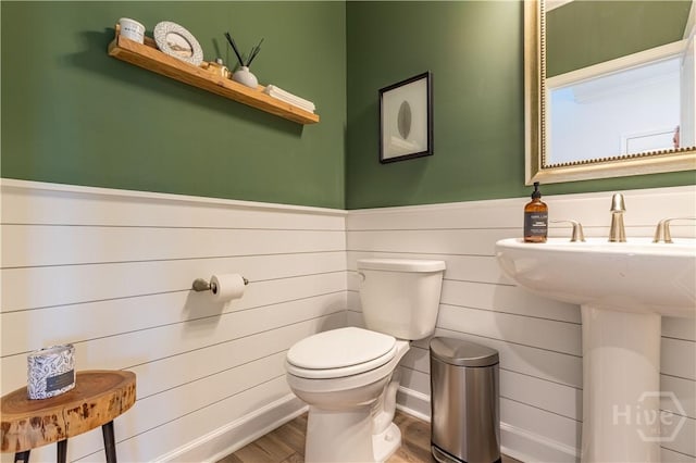 33 Spring Hill Dr, Richmond Hill, GA 31324 - half bath with wood finished floors and a wainscoted wall
