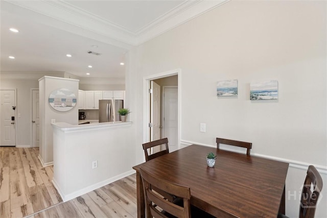 2536 Whitemarsh Way, Savannah, GA 31410 - dining room with ornamental molding, light wood finished floors, and recessed lighting