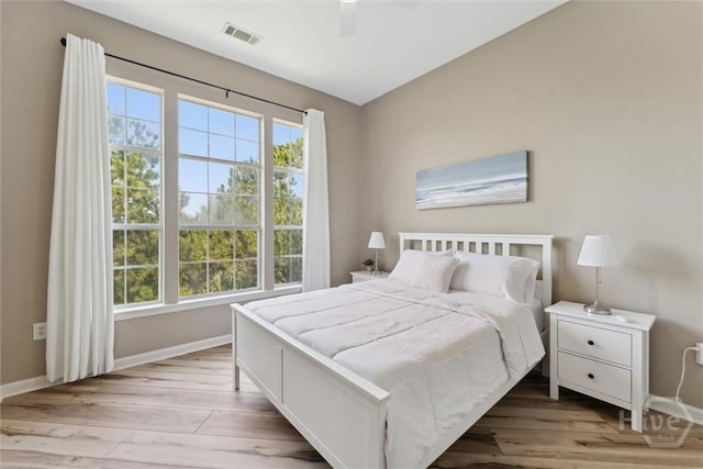 2536 Whitemarsh Way, Savannah, GA 31410 - bedroom with light wood-style floors and a ceiling fan