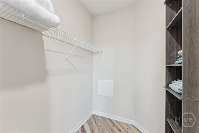 2536 Whitemarsh Way, Savannah, GA 31410 - walk in closet with wood finished floors