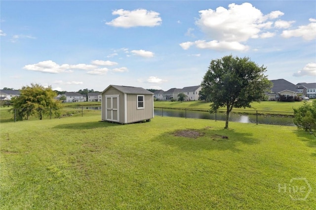 54 Winslow, Savannah, GA 31407 - fenced backyard with a water view, a storage unit, and a residential view