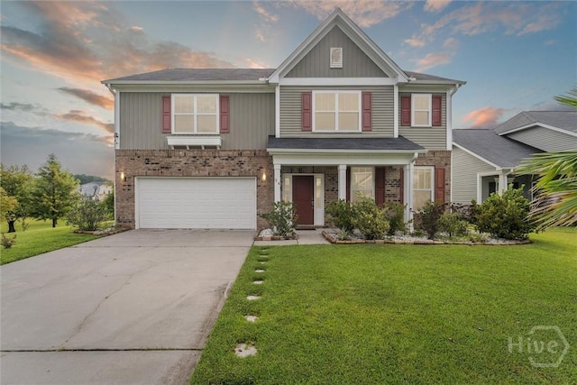 54 Winslow, Savannah, GA 31407 - craftsman-style home featuring brick siding, driveway, a garage, and a front lawn