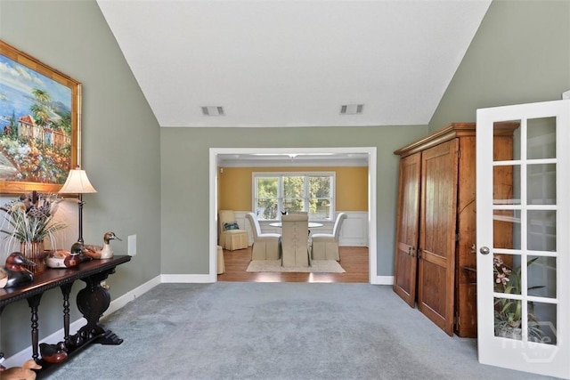 114 Lakeview Ct, Savannah, GA 31406 - bedroom with vaulted ceiling, carpet, and french doors