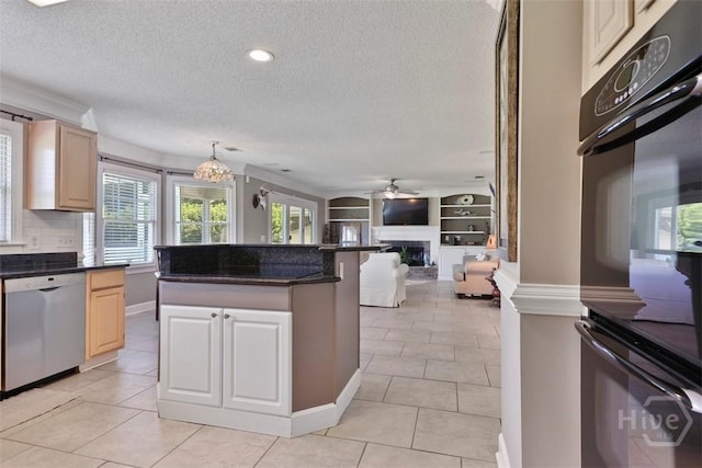 114 Lakeview Ct, Savannah, GA 31406 - kitchen with dishwasher, a textured ceiling, dark countertops, open floor plan, and light tile patterned flooring