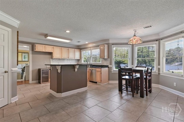 114 Lakeview Ct, Savannah, GA 31406 - kitchen with light brown cabinets, ornamental molding, dishwasher, beverage cooler, and a textured ceiling