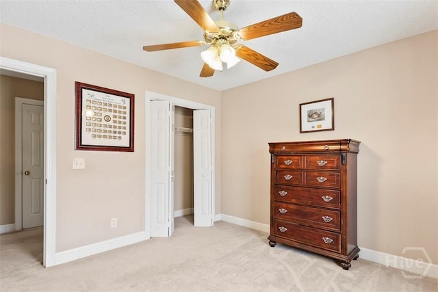 114 Lakeview Ct, Savannah, GA 31406 - bedroom with light colored carpet, a closet, and ceiling fan