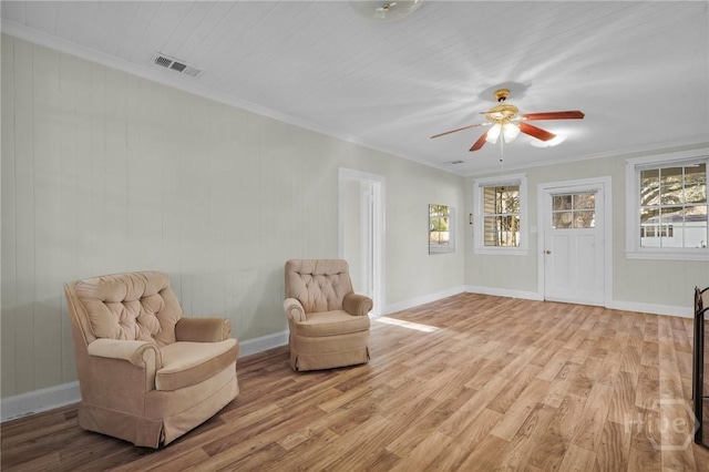 345 Magnolia St, Richmond Hill, GA 31324 - sitting room with light wood-type flooring, ornamental molding, and a ceiling fan
