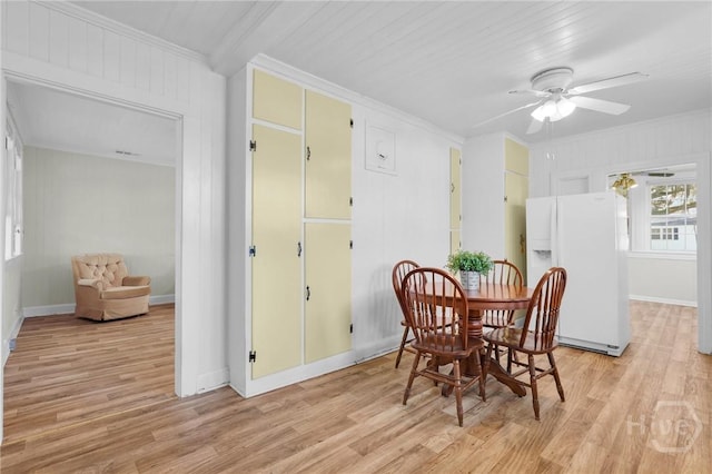 345 Magnolia St, Richmond Hill, GA 31324 - dining space with ornamental molding, light wood-style flooring, and ceiling fan