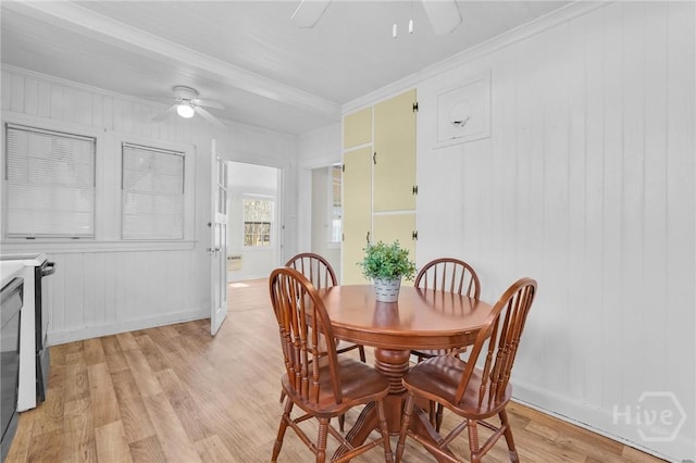 345 Magnolia St, Richmond Hill, GA 31324 - dining room with ceiling fan, light wood-style floors, and crown molding