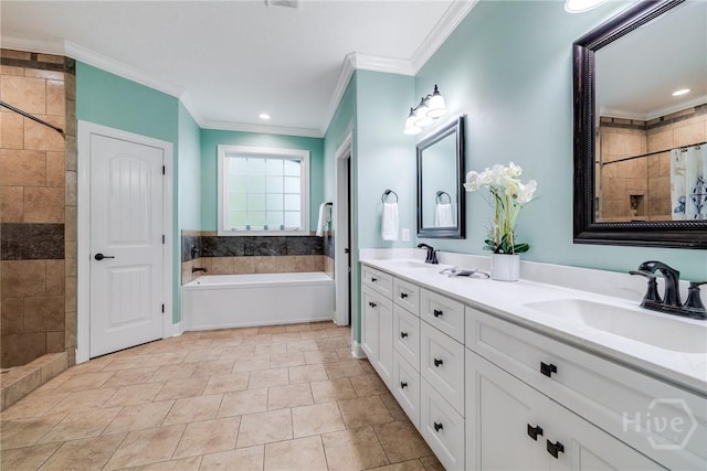523 Goodman Dr, Midway, GA 31320 - bathroom with crown molding, double vanity, tiled shower, a garden tub, and tile patterned flooring