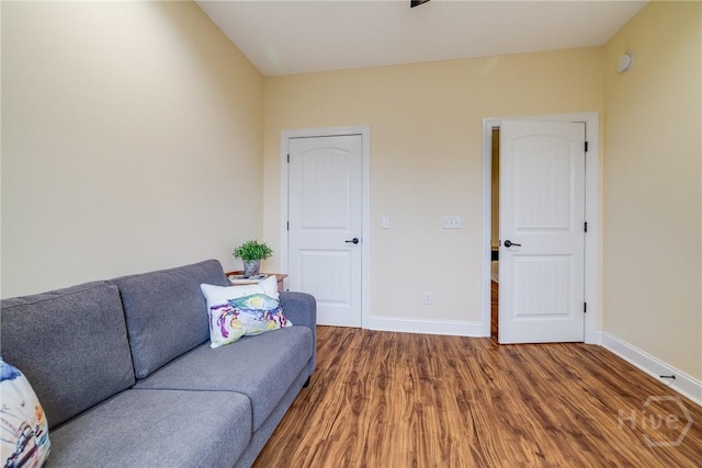 523 Goodman Dr, Midway, GA 31320 - living area with wood finished floors and baseboards