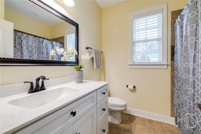 523 Goodman Dr, Midway, GA 31320 - bathroom with vanity, tile patterned flooring, and a shower with shower curtain