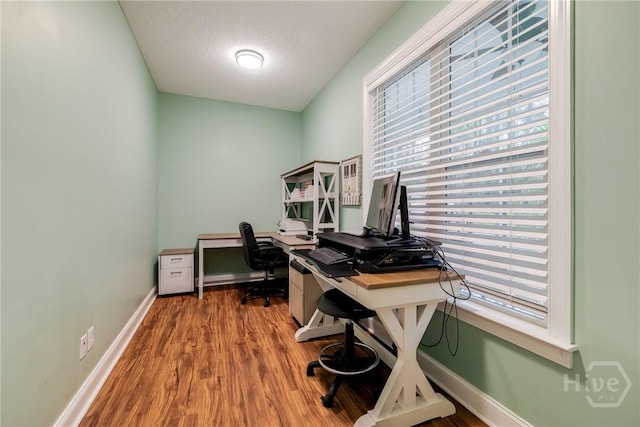 523 Goodman Dr, Midway, GA 31320 - office space with healthy amount of natural light and wood finished floors