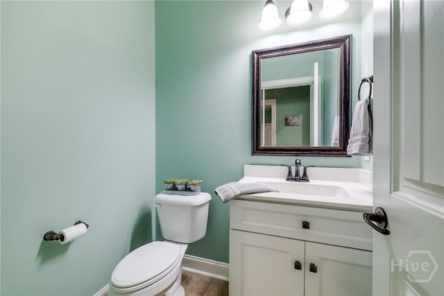 523 Goodman Dr, Midway, GA 31320 - half bathroom with vanity and tile patterned floors