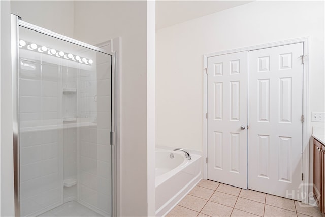143 Regency Cir, Pooler, GA 31322 - full bath featuring vanity, tile patterned flooring, a garden tub, and a shower stall