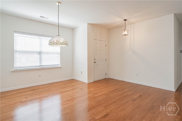 143 Regency Cir, Pooler, GA 31322 - spare room with light wood-style floors and a chandelier