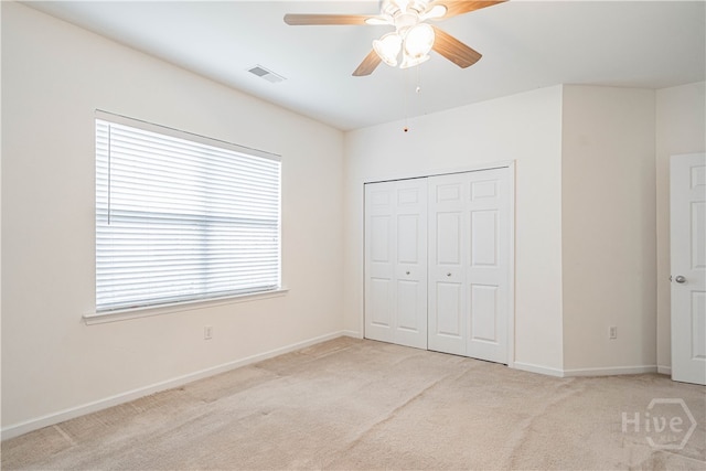 143 Regency Cir, Pooler, GA 31322 - unfurnished bedroom with carpet flooring, a closet, and a ceiling fan