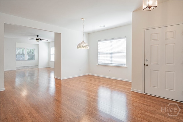 143 Regency Cir, Pooler, GA 31322 - foyer entrance with light wood-style floors and a ceiling fan