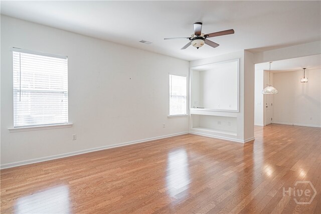 143 Regency Cir, Pooler, GA 31322 - spare room featuring light wood-style floors and a ceiling fan