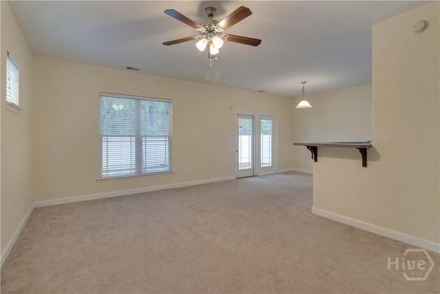 650 Summer Hill Way, Richmond Hill, GA 31324 - unfurnished room with plenty of natural light, light colored carpet, and ceiling fan