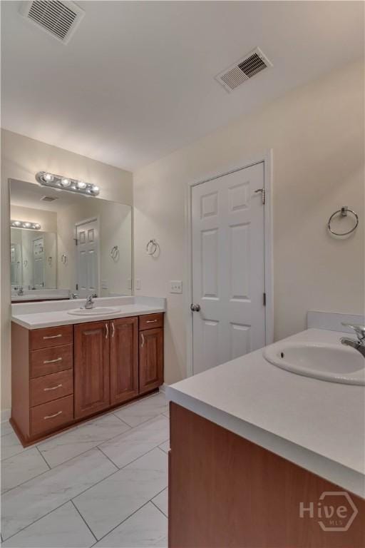650 Summer Hill Way, Richmond Hill, GA 31324 - bathroom with vanity and marble finish floors