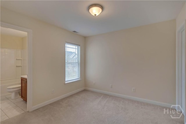 650 Summer Hill Way, Richmond Hill, GA 31324 - unfurnished bedroom featuring light colored carpet and connected bathroom