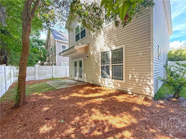 650 Summer Hill Way, Richmond Hill, GA 31324 - rear view of property featuring a patio area, a fenced backyard, and french doors