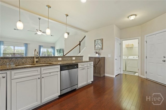 121 Belle Gate Dr, Pooler, GA 31322 - kitchen featuring separate washer and dryer, stainless steel dishwasher, a ceiling fan, white cabinetry, and dark stone countertops