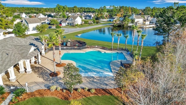 121 Belle Gate Dr, Pooler, GA 31322 - community pool with a water view, a residential view, and a patio
